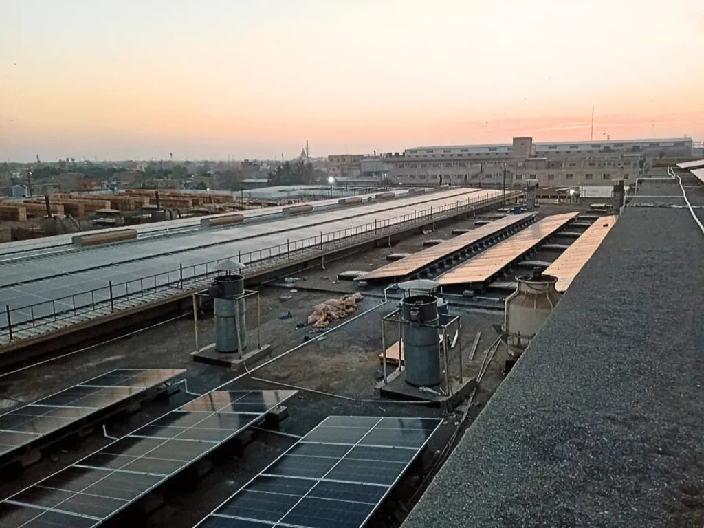 A beautiful sunset peaking through a 495kW solar system installed in Karachi